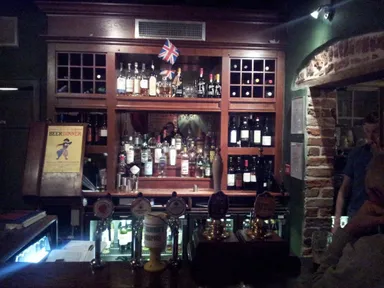 A poorly lit picture of the beautiful bar and its beautiful ales.