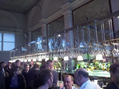 A view of the bar. Looking for a place to sit? Good luck.
