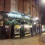 The entrance along Mill Hill.