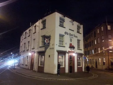 The Old Red Lion stands alone just south of the river.