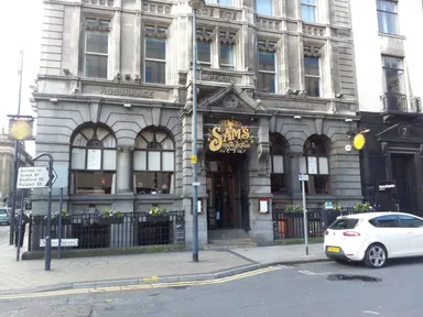 The Pearl Assurance building. You're assured of a pint whichever side you enter.