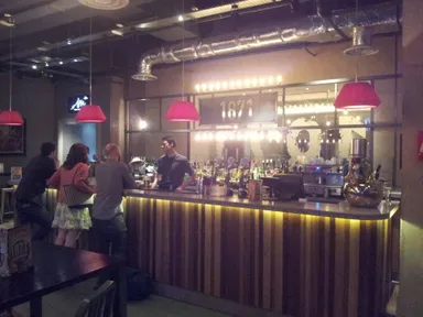The bar and one of its very friendly staff. You can't tell from this photo but I'm asking him ridiculous questions.
