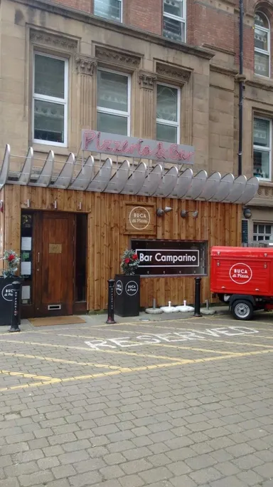 Our original picture of the outside was... er... a bit dark so here's a daytime one where it's very closed.