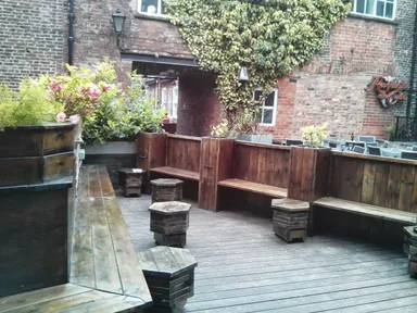 A lovely beer garden. The seats make it feel a bit sauna-like.