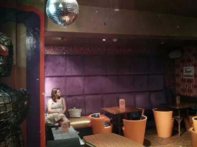 Does Emily know that there's a monster lurking around the corner?