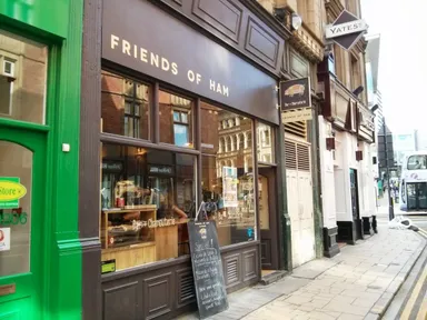 Look for the dead pig in the window. I promise it's the only one on this street.