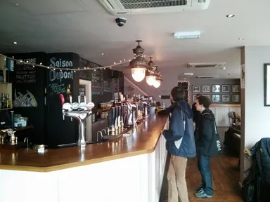 The bar. Look at all those casks and kegs!
