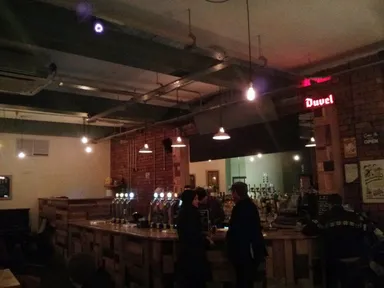 The bar. And is that a giant Lego head in the corner? It is!