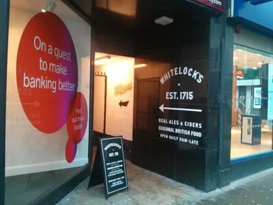 Keep an eye out for this sign on Briggate, beckoning you inside!