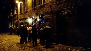 Lots of people in the courtyard: maybe because it's tiny inside?
