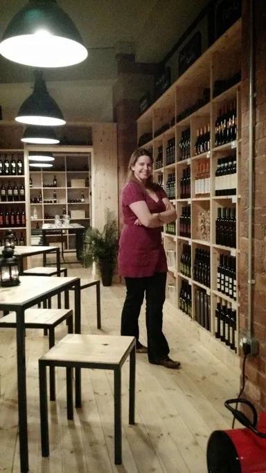 Emily peruses the extensive wine selection.