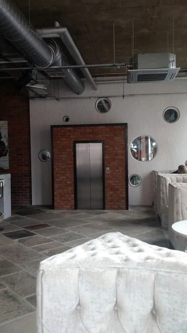 Heading into the restaurant? Why have a door when you can have a fake lift?