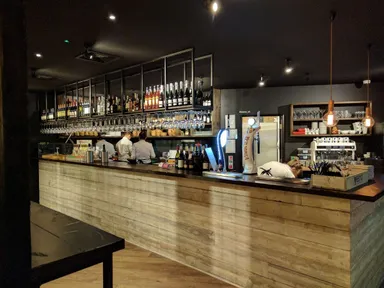 Not just about the wine. If you look closely behind this bar you'll find tasty Italian crafts!